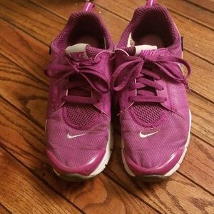 Purple Nike tennis shoes